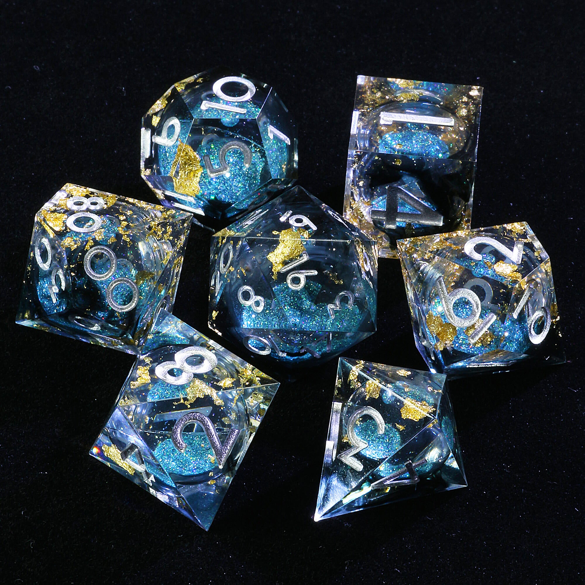 7 Polyhedral Resin Liquid Core Set of Dice DD Gold Paper Blue - Dice of Dragons