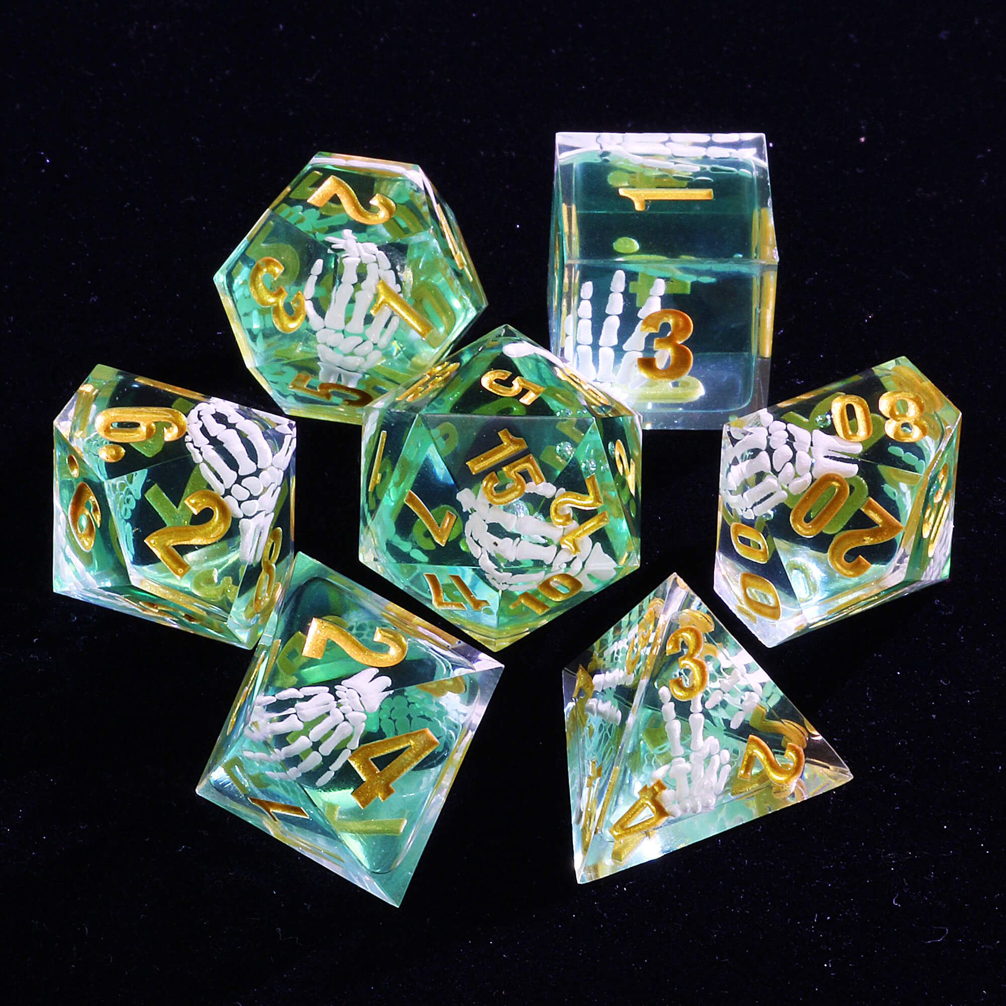 7 Polyhedral Resin Full DnD Dice Set Skeleton Palm - Dice of Dragons