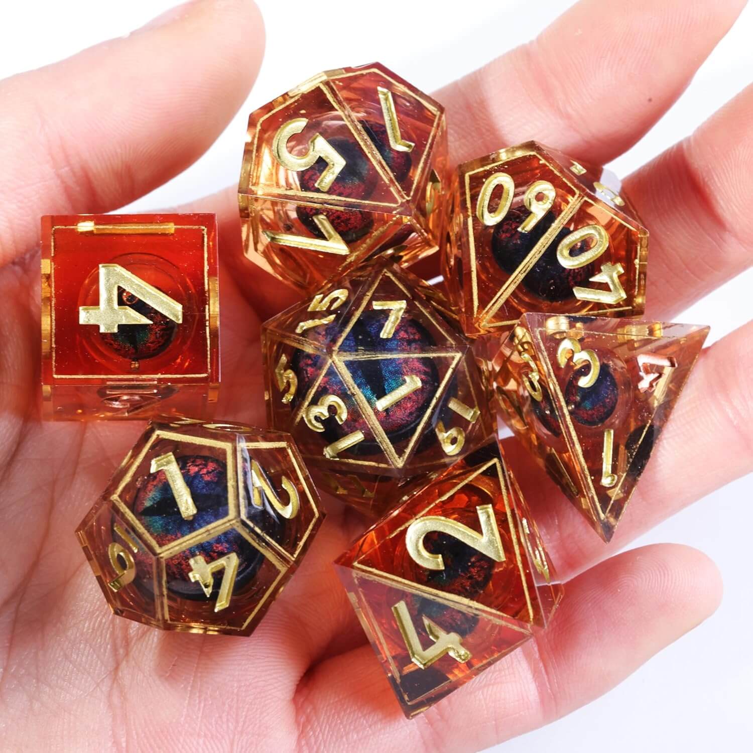 D&D 7-Piece Sharp Edge Liquid Dragon Eye Polyhedral Resin Dice Set - Dice of Dragons