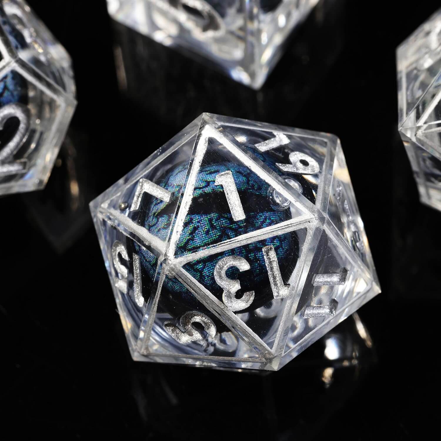 D&D 7-Piece Silver Liquid Core Dragon Eye Polyhedral Resin Dice Set - Dice of Dragons