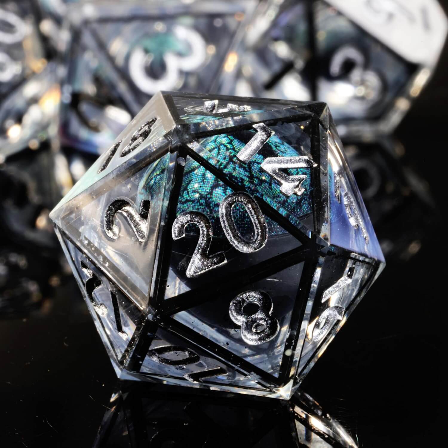 Sharp Edge Black Liquid Core Dragon Eye Polyhedral Resin 7-Piece D&D Dice Set - Dice of Dragons