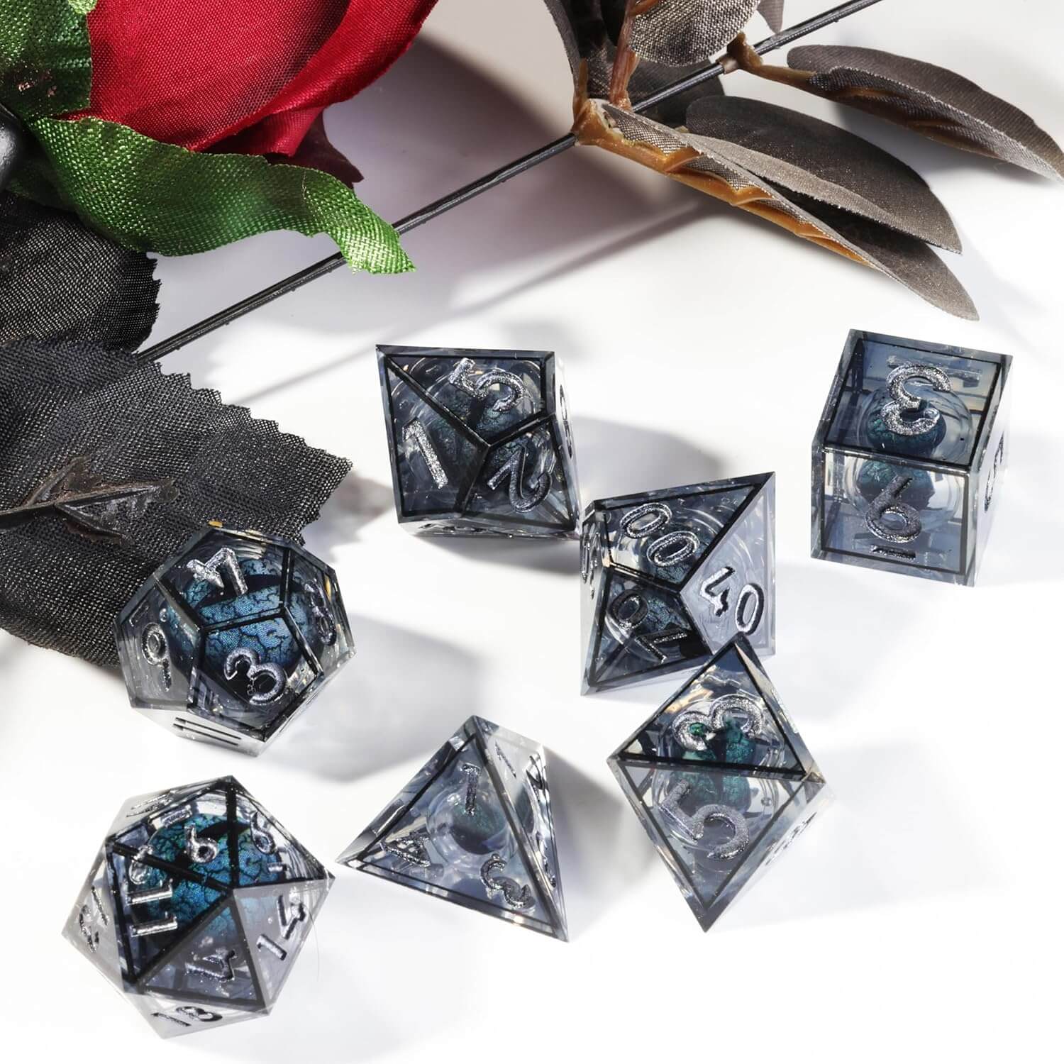 Sharp Edge Black Liquid Core Dragon Eye Polyhedral Resin 7-Piece D&D Dice Set - Dice of Dragons